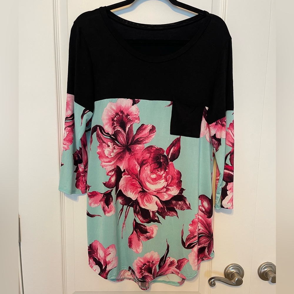 Boutique top.  I cannot read the tag to see material.